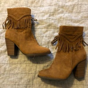 Brown fringe heeled boots